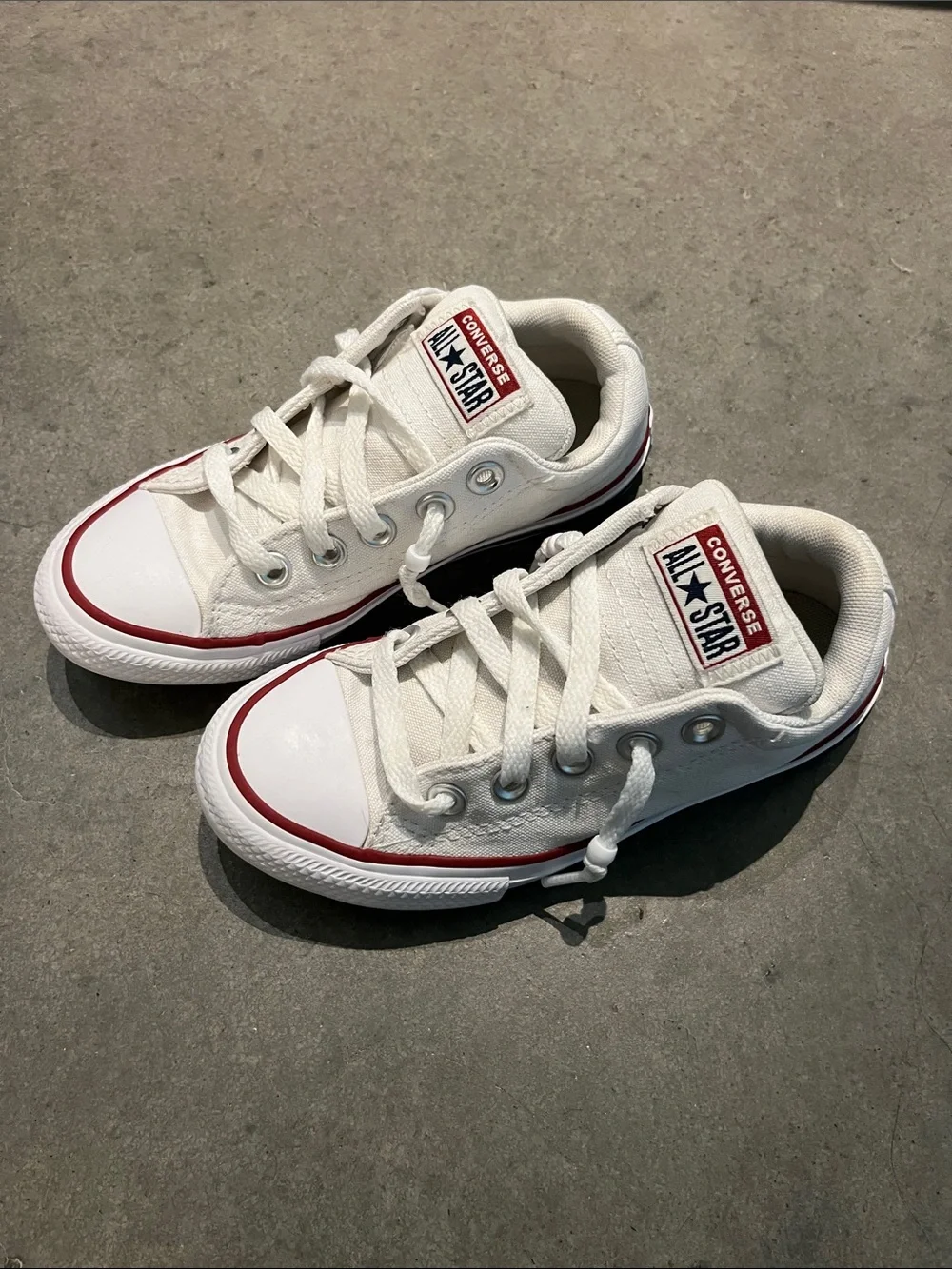 Converse Kids Low Top Sneakers in White with Red Trim